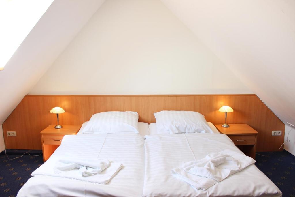 Hotel Pension Kirschstein Волгаст Стая снимка